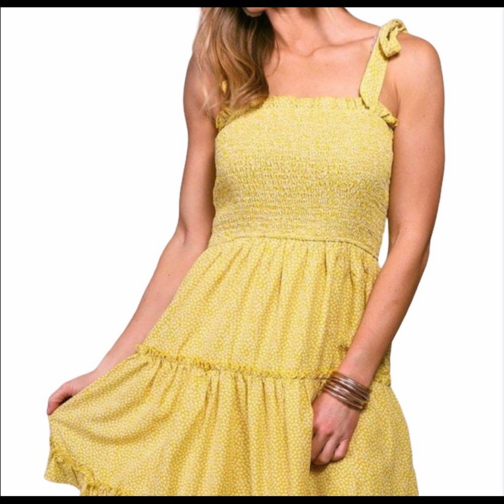 Smocked yellow sundress with tie straps